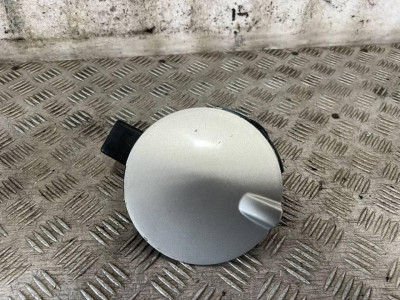TAPA EXTERIOR COMBUSTIBLE