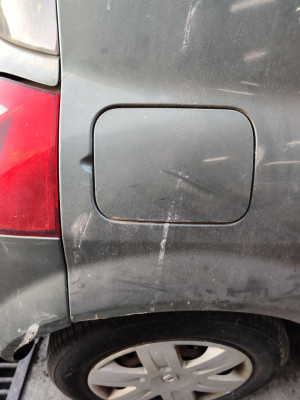 TAPA EXTERIOR COMBUSTIBLE