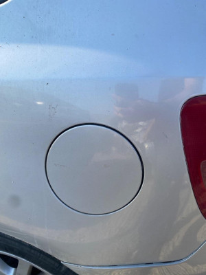 TAPA EXTERIOR COMBUSTIBLE