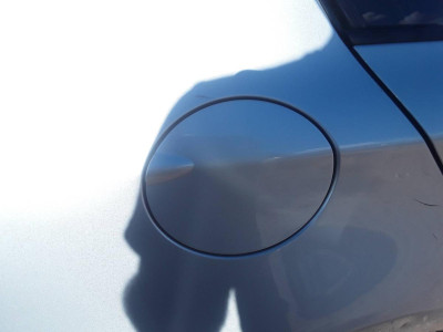 TAPA EXTERIOR COMBUSTIBLE
