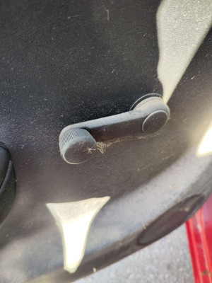 MANETA ELEVALUNAS TRASERA IZQUIERDA