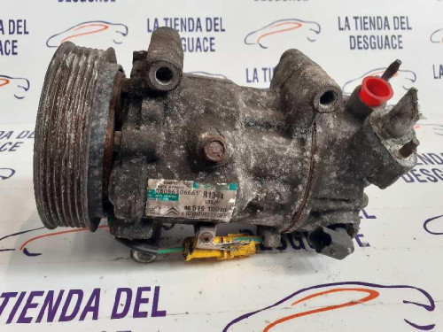  COMPRESOR AIRE ACONDICIONADO 