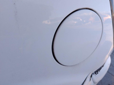 TAPA EXTERIOR COMBUSTIBLE