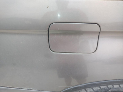 TAPA EXTERIOR COMBUSTIBLE