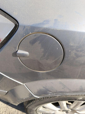 TAPA EXTERIOR COMBUSTIBLE