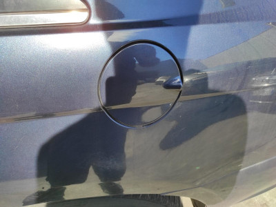 TAPA EXTERIOR COMBUSTIBLE