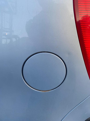 TAPA EXTERIOR COMBUSTIBLE