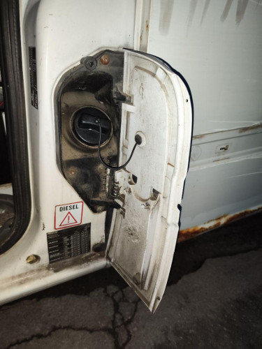 TAPA EXTERIOR COMBUSTIBLE used