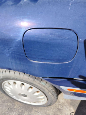 TAPA EXTERIOR COMBUSTIBLE