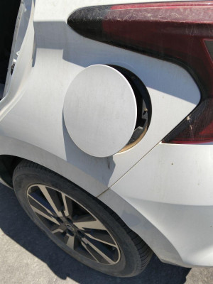 TAPA EXTERIOR COMBUSTIBLE