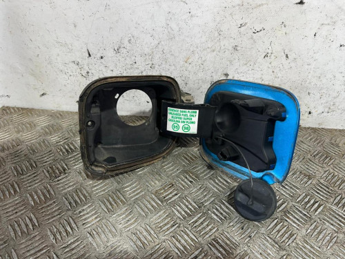 TAPA EXTERIOR COMBUSTIBLE 