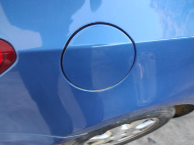 TAPA EXTERIOR COMBUSTIBLE