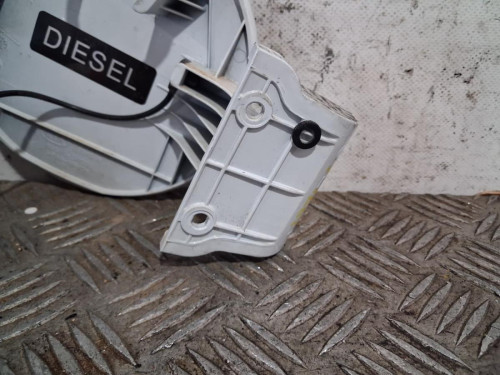 TAPA EXTERIOR COMBUSTIBLE 