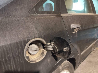 TAPA EXTERIOR COMBUSTIBLE