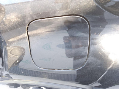 TAPA EXTERIOR COMBUSTIBLE