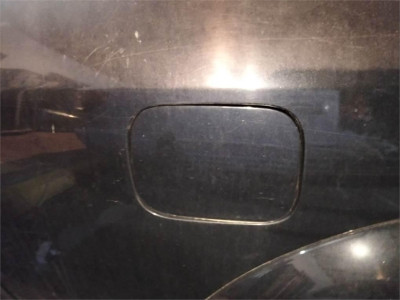 TAPA EXTERIOR COMBUSTIBLE