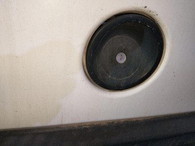 TAPA EXTERIOR COMBUSTIBLE