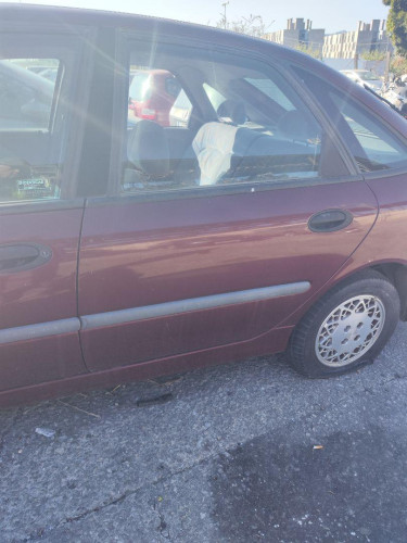PUERTA TRASERA IZQUIERDA Renault LAGUNA (B56) 