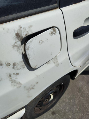 TAPA EXTERIOR COMBUSTIBLE