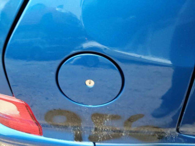 TAPA EXTERIOR COMBUSTIBLE