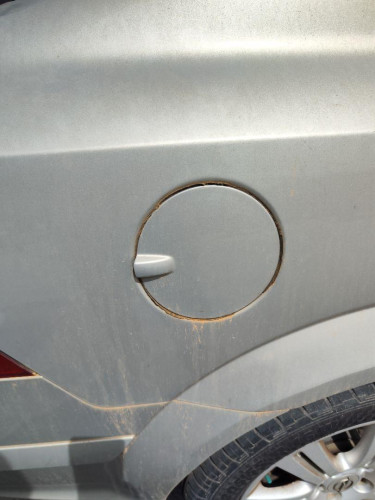 TAPA EXTERIOR COMBUSTIBLE OPEL ASTRA H BERLINA 