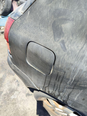 TAPA EXTERIOR COMBUSTIBLE